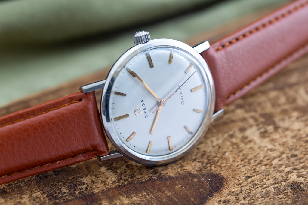 VINTAGE MANUAL WIND STAINLESS STEEL OMEGA GENEVE WATCH CAL.600 DATED 1964 IN EXCELLENT CONDITION